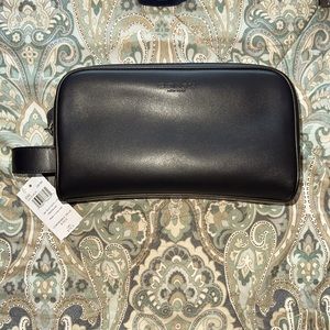 NWT Coach Leather Travel Bag. Brand new. Never used,with tags. Retail Price:$178